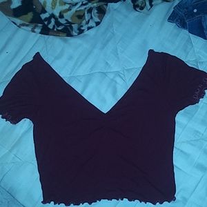 a maroon crop top